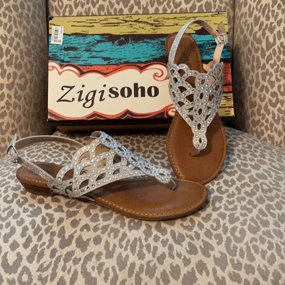 Really cute new with tags silver bling sandals!